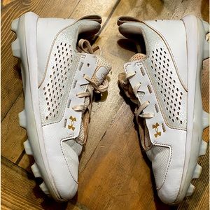 Under Armour molded cleats Youth size 3.5 1 season in red dirt fields.